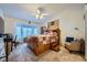 Serene main bedroom with bay window, comfortable furnishings, and a ceiling fan at 2401 Ocean Edge Ct, Las Vegas, NV 89134