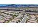 Expansive aerial view of a vibrant community featuring well-maintained homes and desert landscaping at 2616 Red Planet St, Henderson, NV 89044