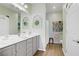 Well-lit bathroom with a double sink vanity, ample storage, and modern fixtures at 2616 Red Planet St, Henderson, NV 89044