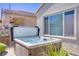 Inviting hot tub surrounded by lush landscaping offering a private backyard experience at 2616 Red Planet St, Henderson, NV 89044