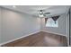 Well-lit bedroom featuring hardwood floors and a ceiling fan at 2708 Beaver Creek Ct # 202, Las Vegas, NV 89117