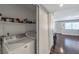Laundry area with shelving and a washing machine at 2708 Beaver Creek Ct # 202, Las Vegas, NV 89117