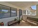 Front patio with seating, tile flooring, shade, and a view of the complex at 2708 Beaver Creek Ct # 202, Las Vegas, NV 89117