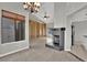 Spacious living room with built-in bookshelves and a fireplace at 2714 Bridgepointe Dr, Las Vegas, NV 89121