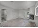 Bedroom with a fireplace, closet, and entry to backyard at 3421 Rochelle Ct, Las Vegas, NV 89121
