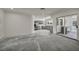 Open floor plan with stainless appliances, flowing to a pool through sliding glass doors at 3421 Rochelle Ct, Las Vegas, NV 89121