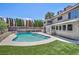 Enjoy this backyard with in-ground pool, surrounded by lush greenery, with privacy and space at 3421 Rochelle Ct, Las Vegas, NV 89121