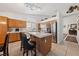 Open kitchen with stainless steel appliances and a central island at 3561 Yorba Linda Dr, Las Vegas, NV 89122