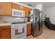 Kitchen featuring stainless steel refrigerator and stove at 3561 Yorba Linda Dr, Las Vegas, NV 89122