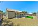 Cozy backyard with gravel landscaping, patio, and small patch of artificial turf at 3622 Covewick Dr, North Las Vegas, NV 89032
