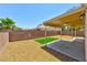 Backyard features patio, rock landscaping and turf at 3622 Covewick Dr, North Las Vegas, NV 89032