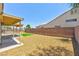 Backyard features patio, rock landscaping and turf at 3622 Covewick Dr, North Las Vegas, NV 89032