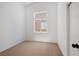 Bedroom features neutral carpet, window, and closet at 3622 Covewick Dr, North Las Vegas, NV 89032