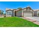Charming single story home with a well-manicured lawn and a two car garage in a quiet neighborhood at 3622 Covewick Dr, North Las Vegas, NV 89032
