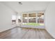 Bright living room showcases wood floors, recessed lighting, and expansive backyard views at 3622 Covewick Dr, North Las Vegas, NV 89032