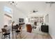 Spacious living room with large windows, modern furnishings, and wood-style flooring at 3622 Covewick Dr, North Las Vegas, NV 89032
