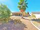 Beautiful backyard with desert landscaping and a covered patio, perfect for relaxing outdoors at 3829 N Mayfield Ranch Rd, Pahrump, NV 89060