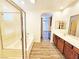 Primary bath featuring a double sink vanity, separate tub and shower at 3829 N Mayfield Ranch Rd, Pahrump, NV 89060