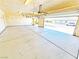 A peek into a spacious garage, showcasing its ample parking and storage at 3829 N Mayfield Ranch Rd, Pahrump, NV 89060
