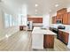 Kitchen with modern cabinets, stainless steel appliances, and a marble island with sink at 3829 N Mayfield Ranch Rd, Pahrump, NV 89060
