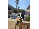 Spacious backyard with ample storage, a playset, and potential for creating an outdoor oasis at 4016 Mountain Trek St, Las Vegas, NV 89129