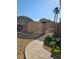 Gated entryway with stone pathway, adding privacy and security to the property at 4016 Mountain Trek St, Las Vegas, NV 89129