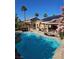 Inviting backyard pool, patio, and lounge area, perfect for outdoor relaxation and entertaining at 4016 Mountain Trek St, Las Vegas, NV 89129