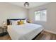 Inviting bedroom with a view, featuring a cozy bed and modern decor at 4072 E Harmon Ave, Las Vegas, NV 89121