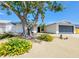 Charming single-story home featuring desert landscaping and a spacious two-car garage at 4072 E Harmon Ave, Las Vegas, NV 89121