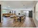 Spacious living room boasting an open layout, modern fireplace, and stylish wood flooring at 4072 E Harmon Ave, Las Vegas, NV 89121