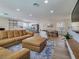 Spacious and bright living area seamlessly flowing into the dining and kitchen spaces, perfect for entertaining at 4072 E Harmon Ave, Las Vegas, NV 89121