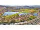 Community aerial featuring lake, golf course, desert landscape, and nearby highway at 41 Strada Moscato, Henderson, NV 89011