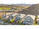 Community aerial view showcasing modern homes, desert landscaping, and mountain views at 41 Strada Moscato, Henderson, NV 89011