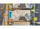 Aerial view highlights a home's solar panels, pristine roof, and a refreshing swimming pool for energy efficiency at 41 Strada Moscato, Henderson, NV 89011