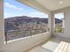 Private balcony featuring views of mountains, blue sky, and natural sunlight at 41 Strada Moscato, Henderson, NV 89011