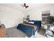 Spacious bedroom featuring natural light, ceiling fan, and comfortable king sized bed at 41 Strada Moscato, Henderson, NV 89011