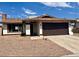 Single-story home featuring gravel landscaping, and an attached two-car garage at 4276 Aspen St, Las Vegas, NV 89147