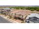 Lovely aerial view of a home and community featuring a serene pond and desert landscape at 453 Winter Dove Ave, Henderson, NV 89011