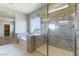 Luxurious bathroom with tub, shower, and granite counters exudes elegance at 453 Winter Dove Ave, Henderson, NV 89011
