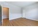 A spacious bedroom offers ample natural light and wood-look flooring throughout at 453 Winter Dove Ave, Henderson, NV 89011