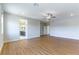 Expansive living space with hardwood floors, recessed lights, and seamless transitions at 453 Winter Dove Ave, Henderson, NV 89011