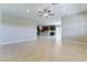 Large open concept room featuring tiled flooring and an open flow to the kitchen at 453 Winter Dove Ave, Henderson, NV 89011