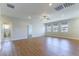 Bright open living area with hardwood floors, neutral walls, and recessed lighting at 453 Winter Dove Ave, Henderson, NV 89011
