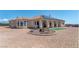 Charming backyard with a cozy seating area, perfect for enjoying the desert sunset at 4545 W Agate Ave, Las Vegas, NV 89139