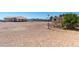Expansive backyard with potential for customization, complemented by mature trees and desert surroundings at 4545 W Agate Ave, Las Vegas, NV 89139