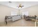 Versatile room with tile flooring, bright lighting, ceiling fan, and equipment for sewing or quilting at 4545 W Agate Ave, Las Vegas, NV 89139