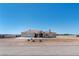 Beautiful home with a three-car garage, tiled roof, and inviting entryway at 4545 W Agate Ave, Las Vegas, NV 89139