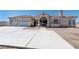 Stunning home with double-door entry, three-car garage, and manicured walkway at 4545 W Agate Ave, Las Vegas, NV 89139