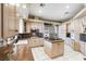 Spacious kitchen with island, granite countertops, and stainless steel refrigerator at 4545 W Agate Ave, Las Vegas, NV 89139