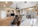 Living room with breakfast bar, fireplace, and comfortable seating at 4545 W Agate Ave, Las Vegas, NV 89139